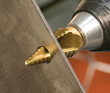 Hougen Step Drill drilling a hole in 1/8" sheet metal